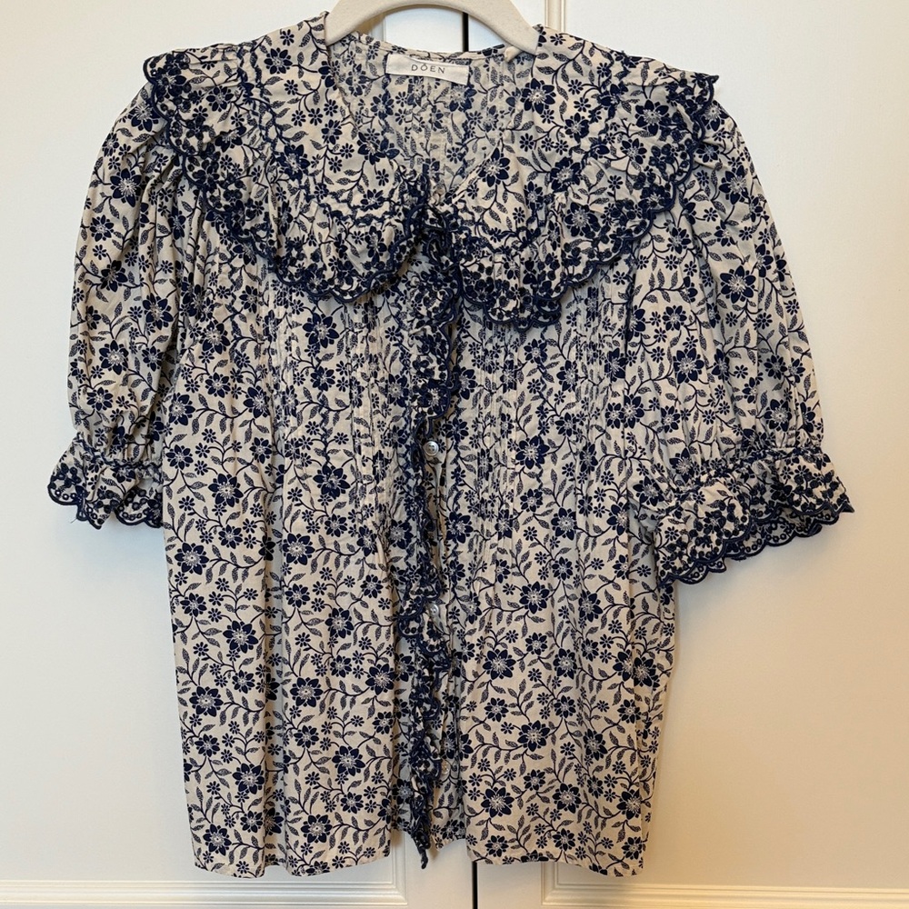 DÔEN Cream and Navy Floral Ruffle Blouse with Eyelet Peter Pan Collar. Size S